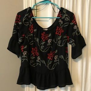 Candie’s off the shoulder peplum top